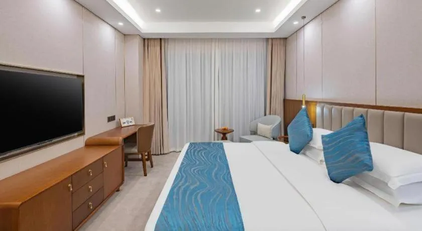 Bed in Yichang Three Gorges Project Hotel