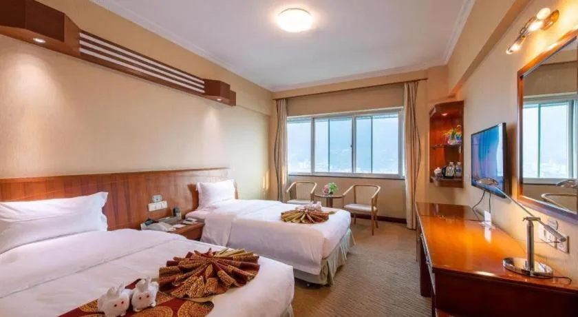 Bed in Yichang Three Gorges Project Hotel