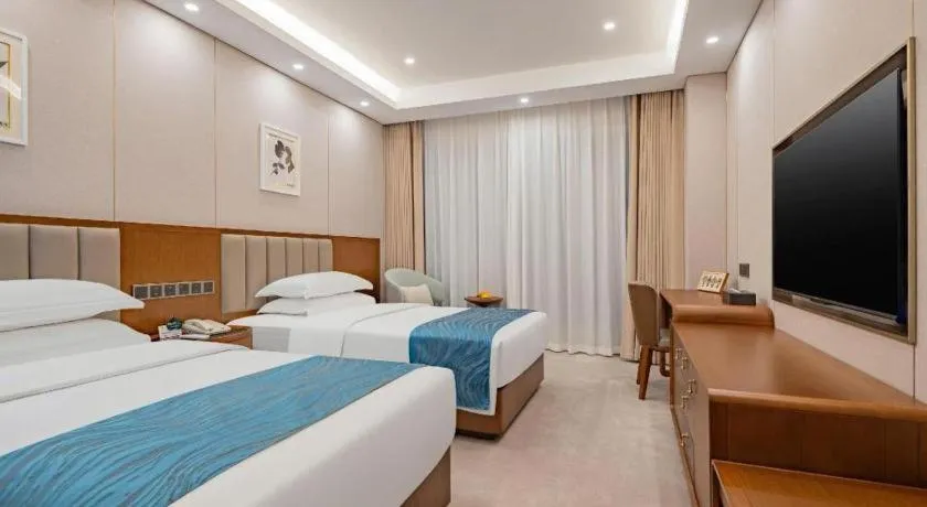 Bed in Yichang Three Gorges Project Hotel
