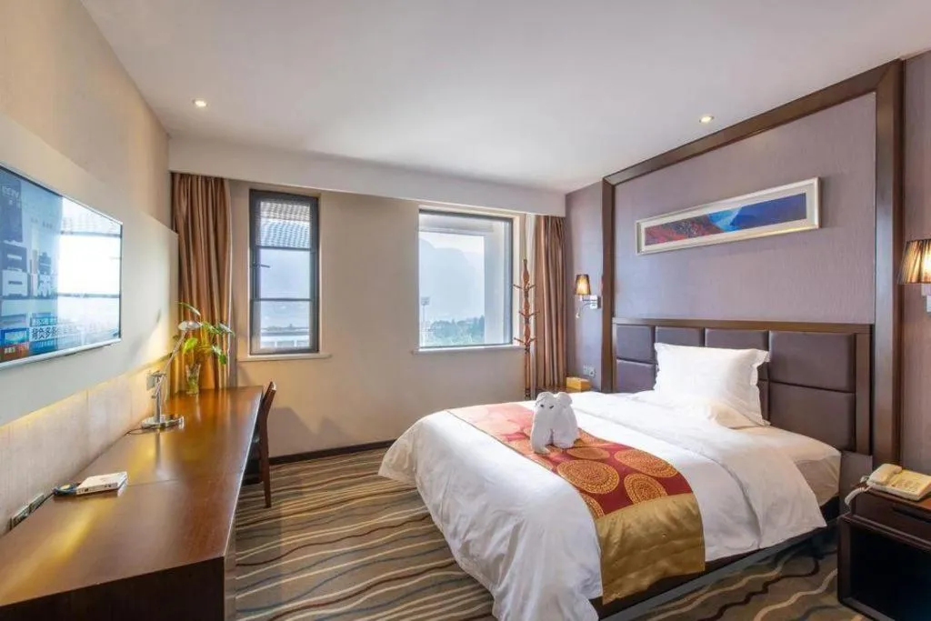 Bed in Yichang Three Gorges Project Hotel