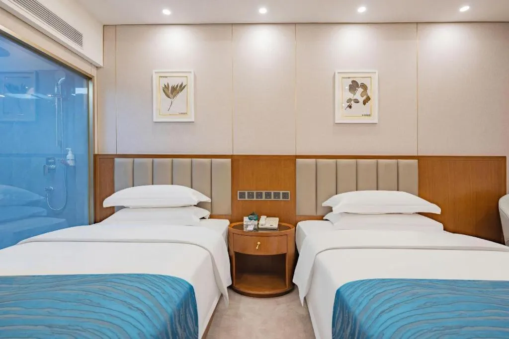 Bed in Yichang Three Gorges Project Hotel