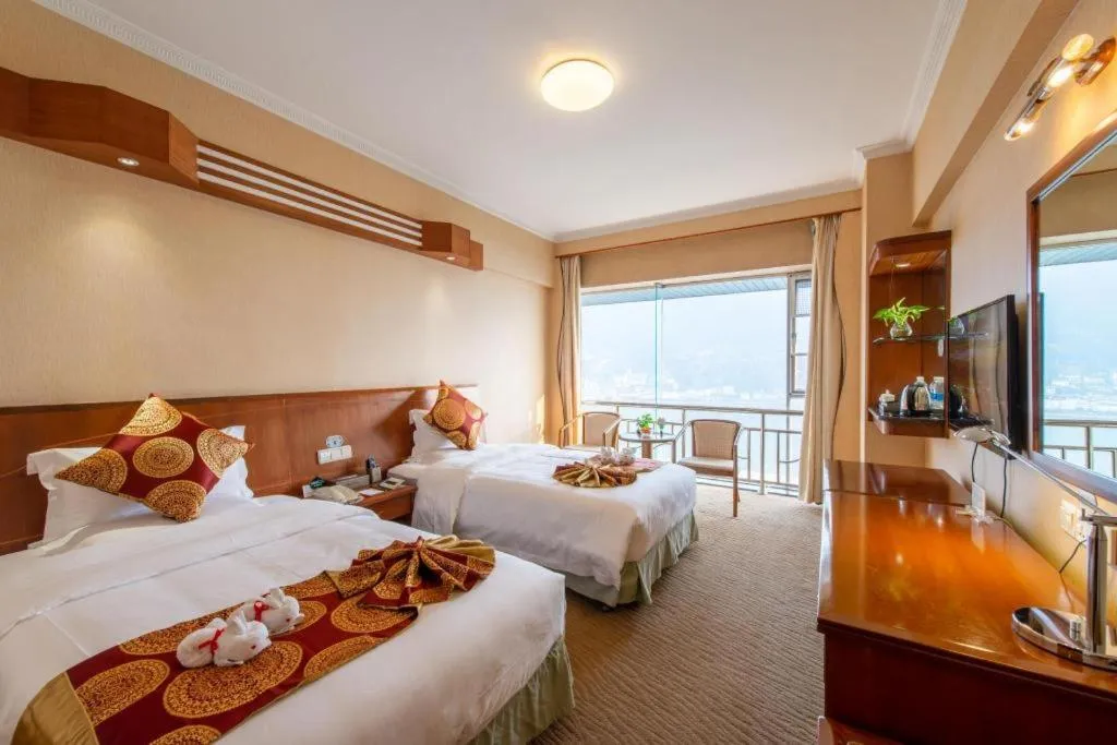 Bed in Yichang Three Gorges Project Hotel