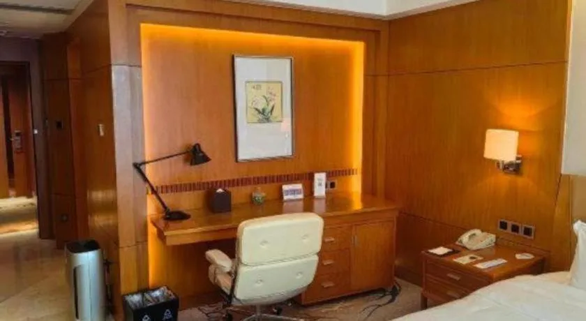 Bed in Fuyang International Trade Centre Hotel