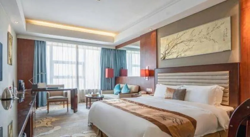 Bed in Fuyang International Trade Centre Hotel