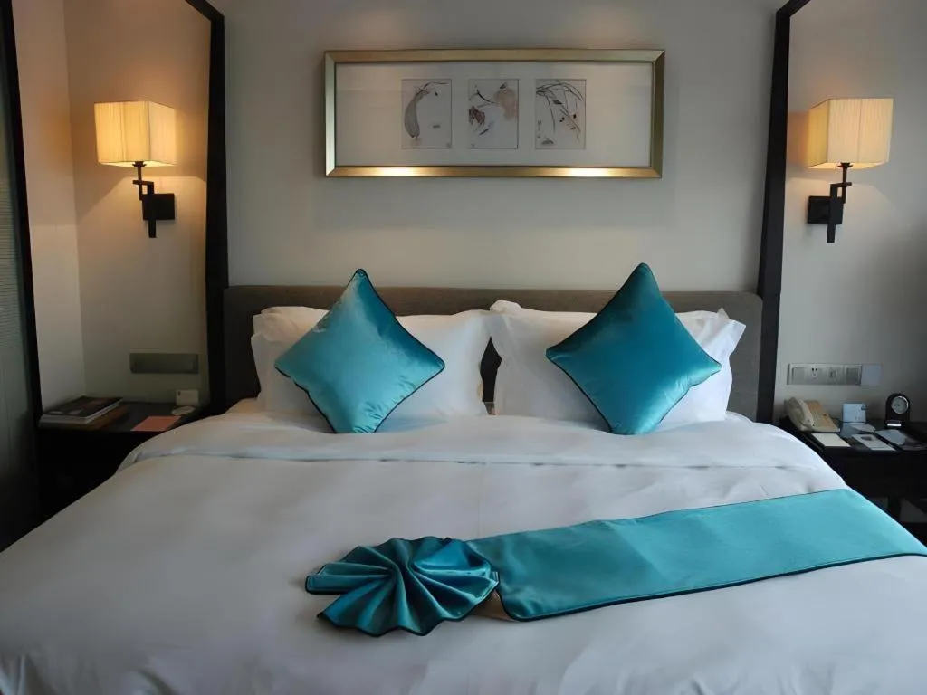 Bed in Fuyang International Trade Centre Hotel