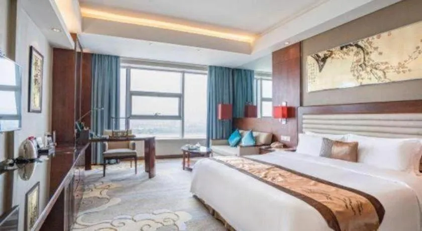Bed in Fuyang International Trade Centre Hotel
