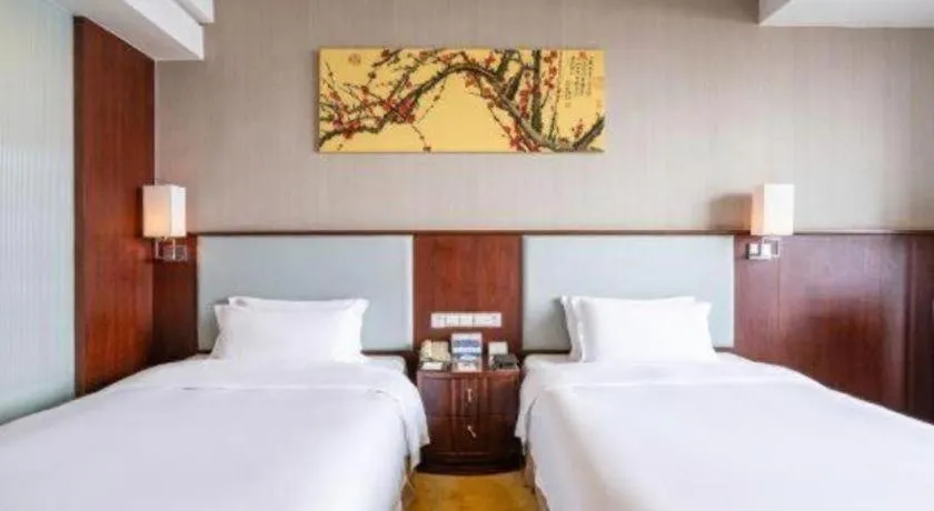 Bed in Fuyang International Trade Centre Hotel