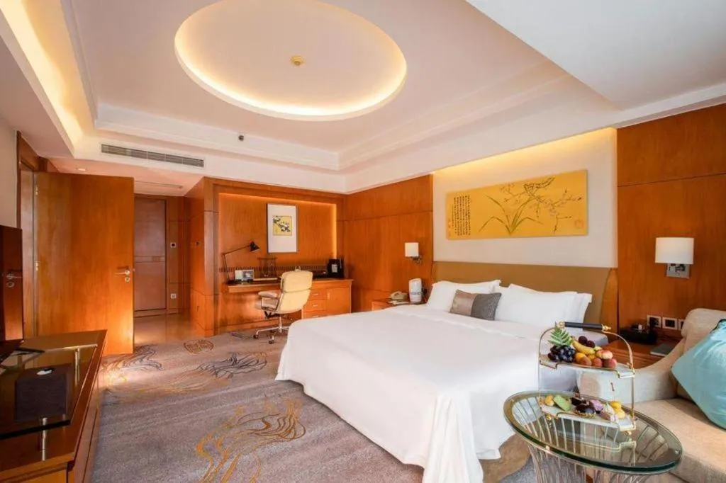 Bed in Fuyang International Trade Centre Hotel