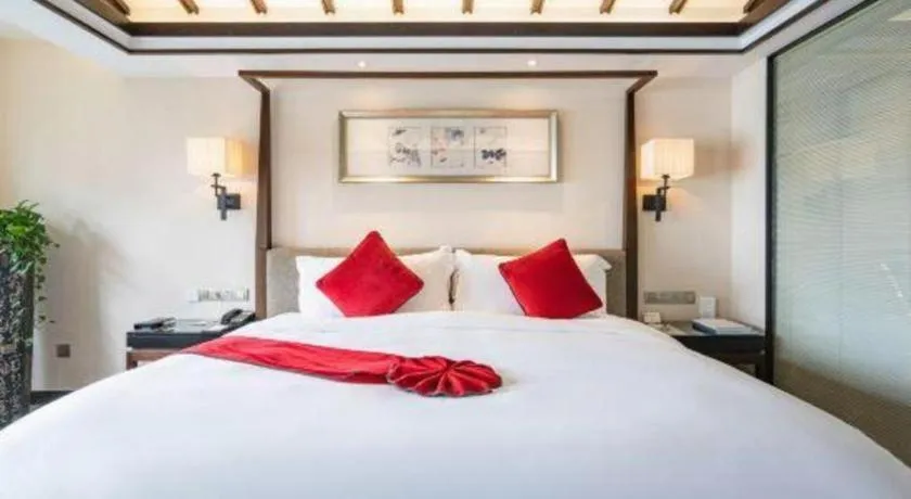 Bed in Fuyang International Trade Centre Hotel