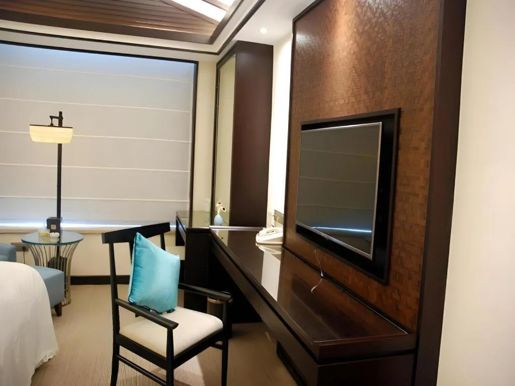 Bed in Fuyang International Trade Centre Hotel