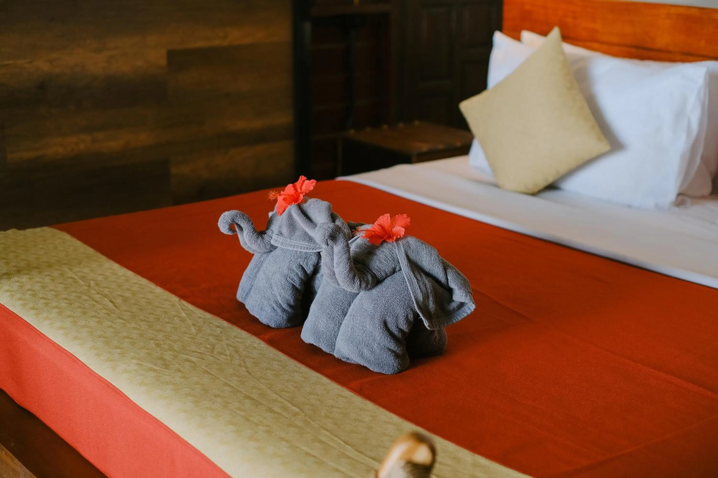 Bed in JOY Bungalow Resort and Restaurant