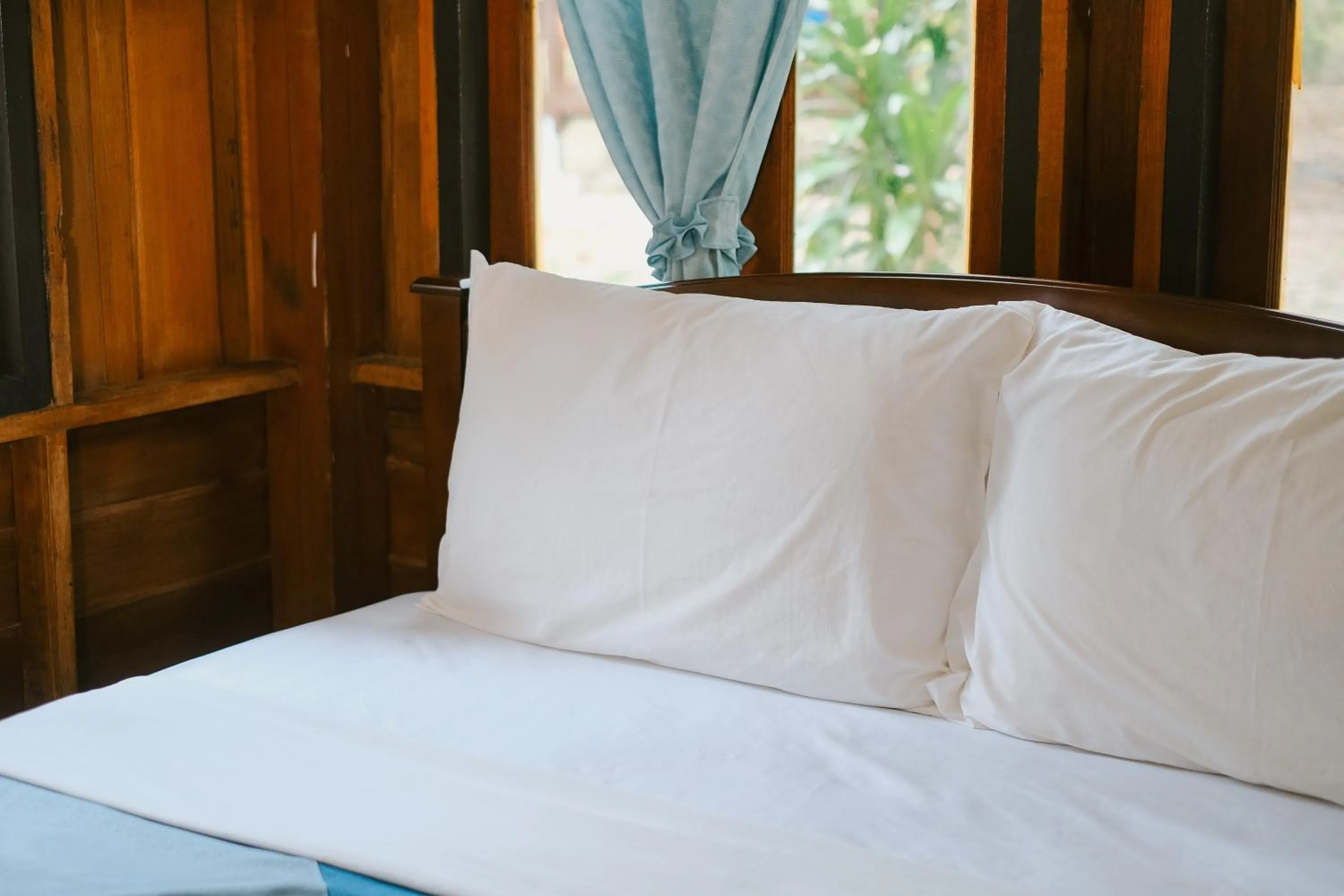 Bed in JOY Bungalow Resort and Restaurant