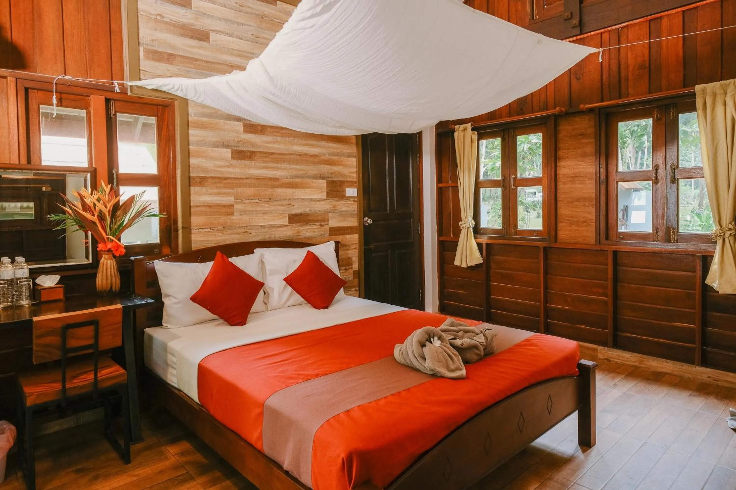 Bed in JOY Bungalow Resort and Restaurant