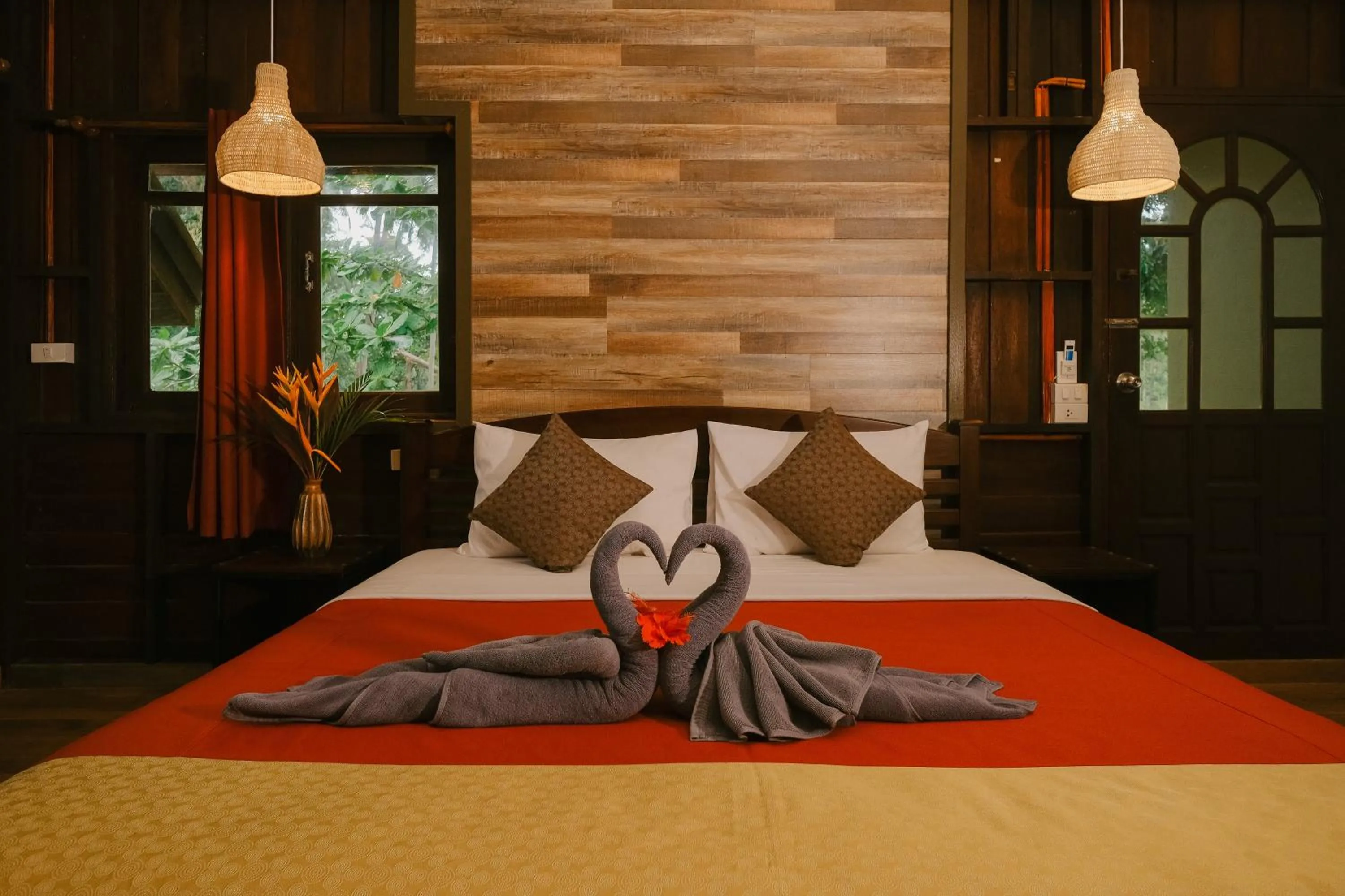 Bed in JOY Bungalow Resort and Restaurant