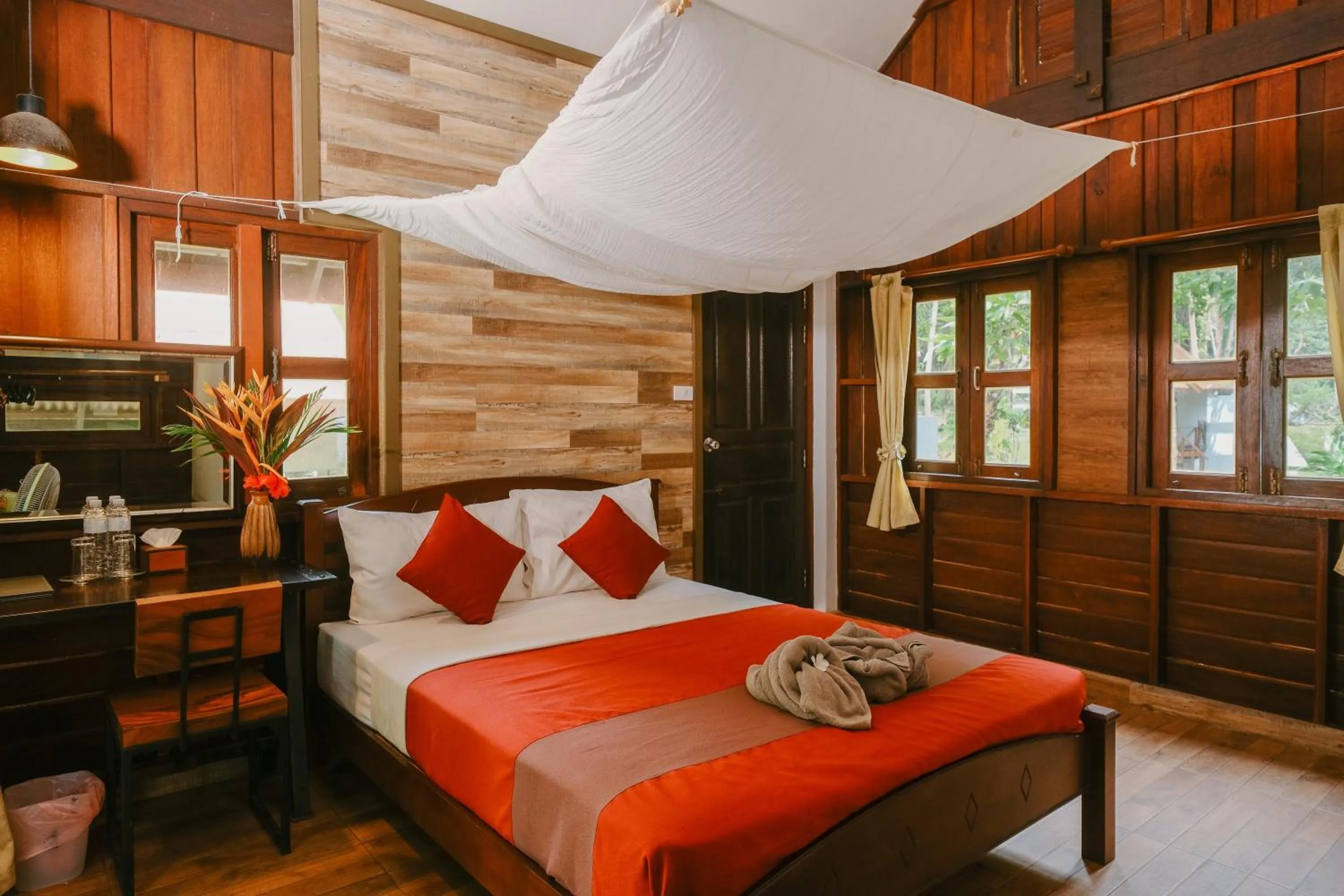 Bed in JOY Bungalow Resort and Restaurant