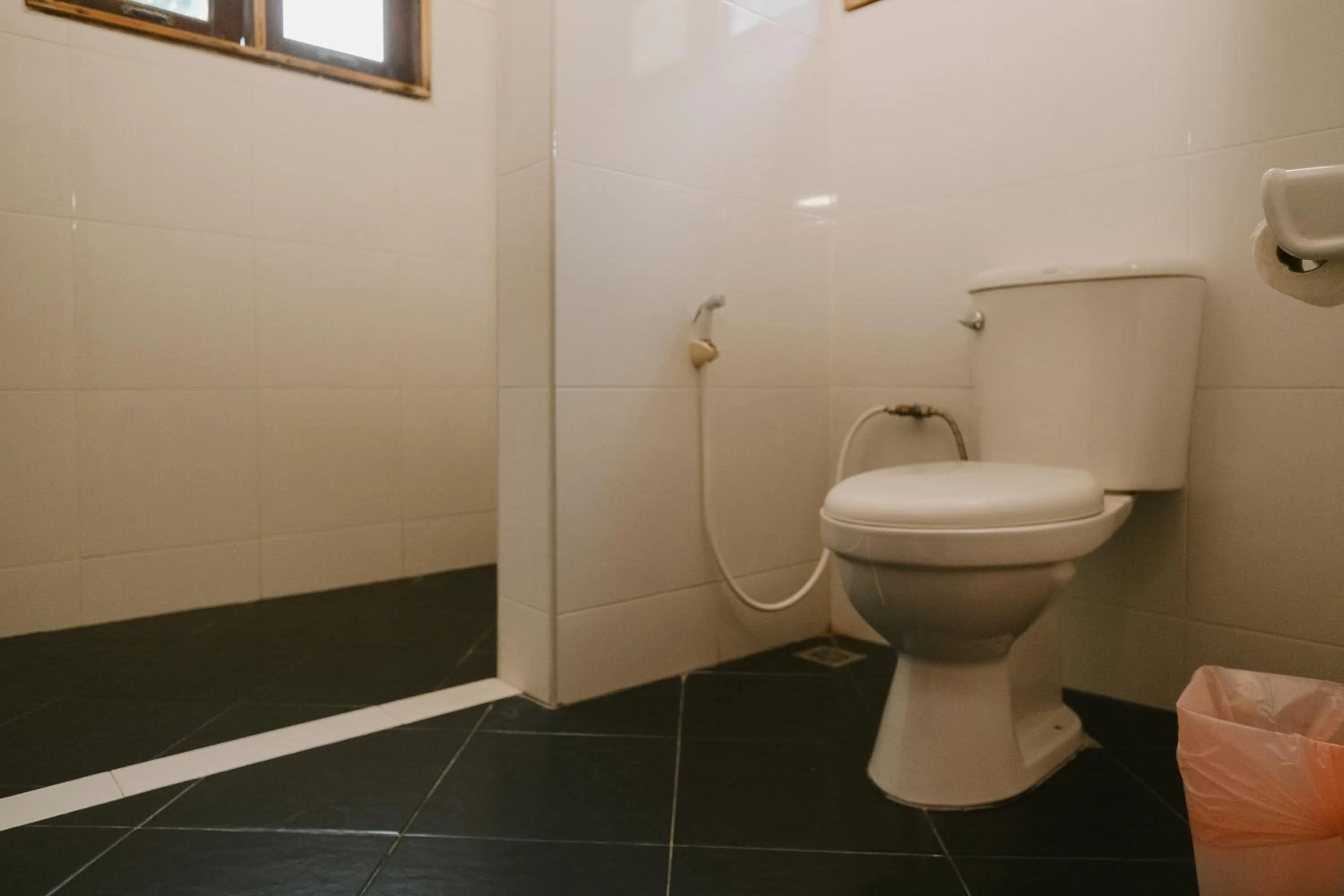 Shower in JOY Bungalow Resort and Restaurant