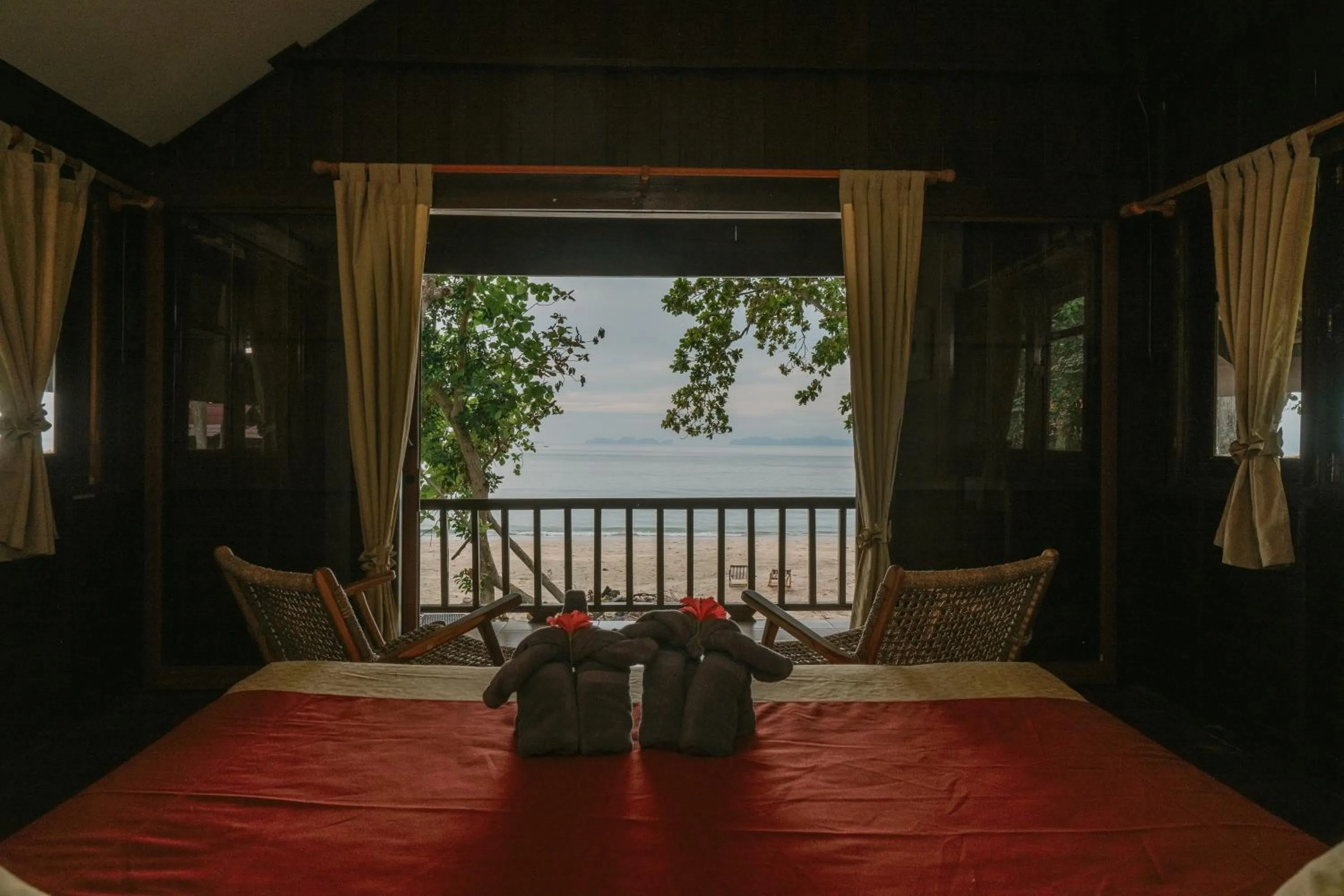 Bed in JOY Bungalow Resort and Restaurant