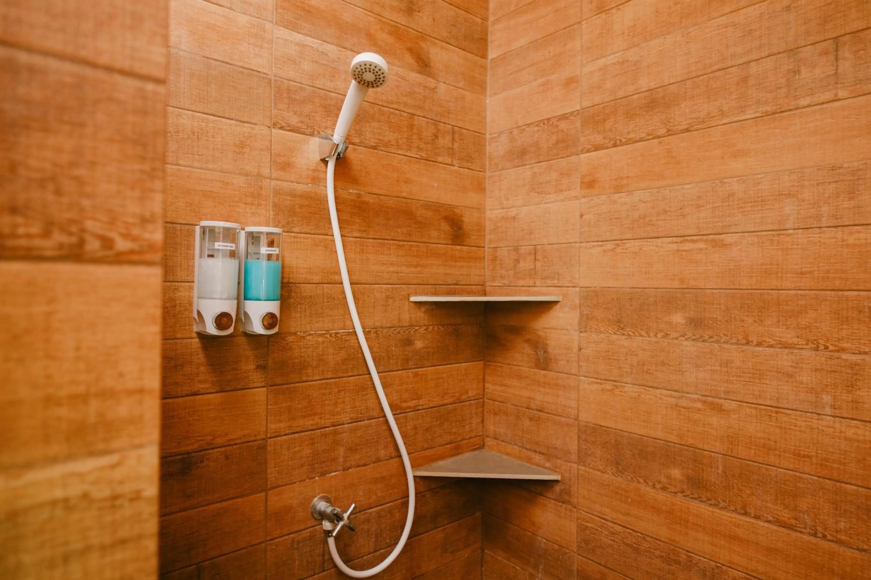 Shower in JOY Bungalow Resort and Restaurant