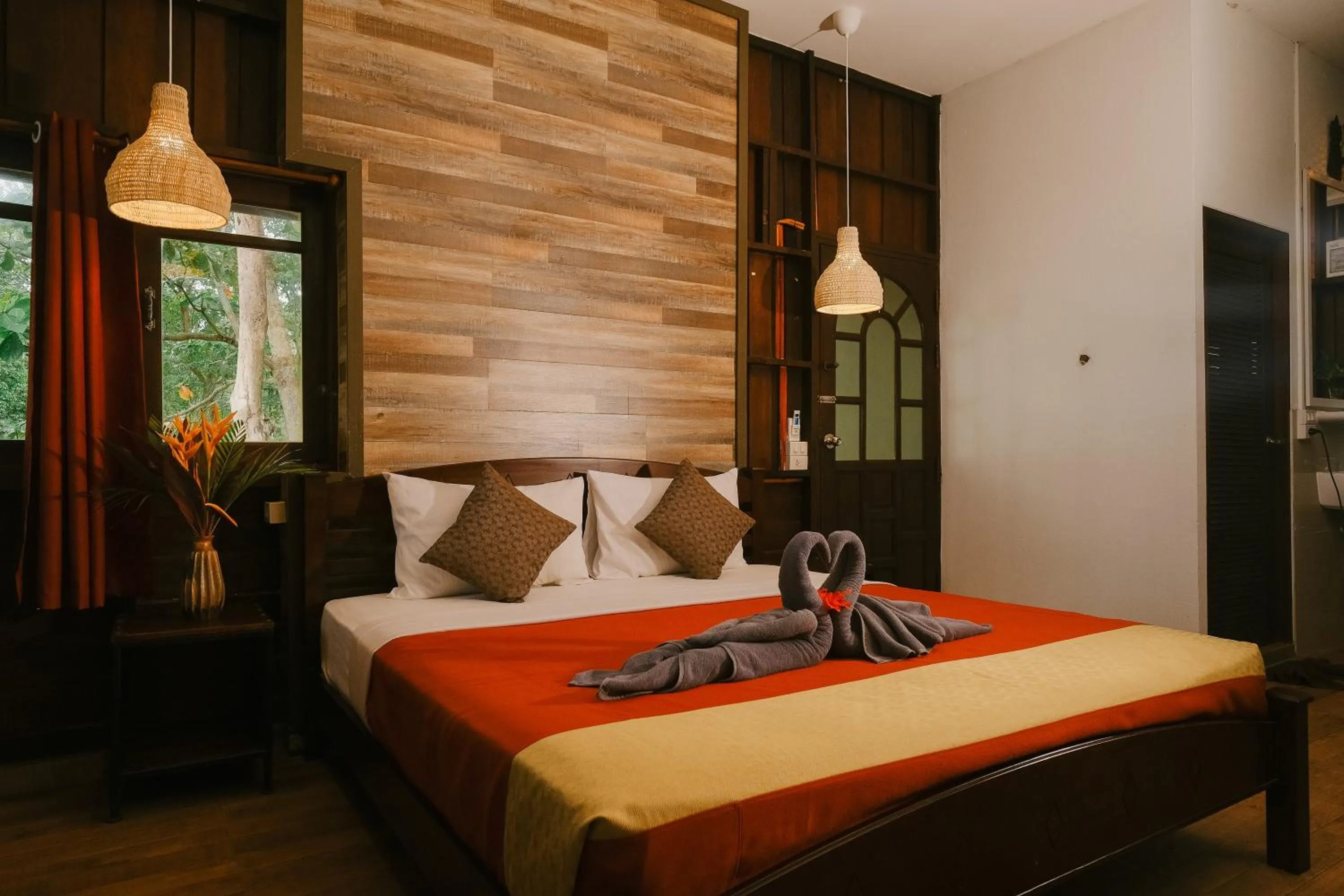 Bed in JOY Bungalow Resort and Restaurant