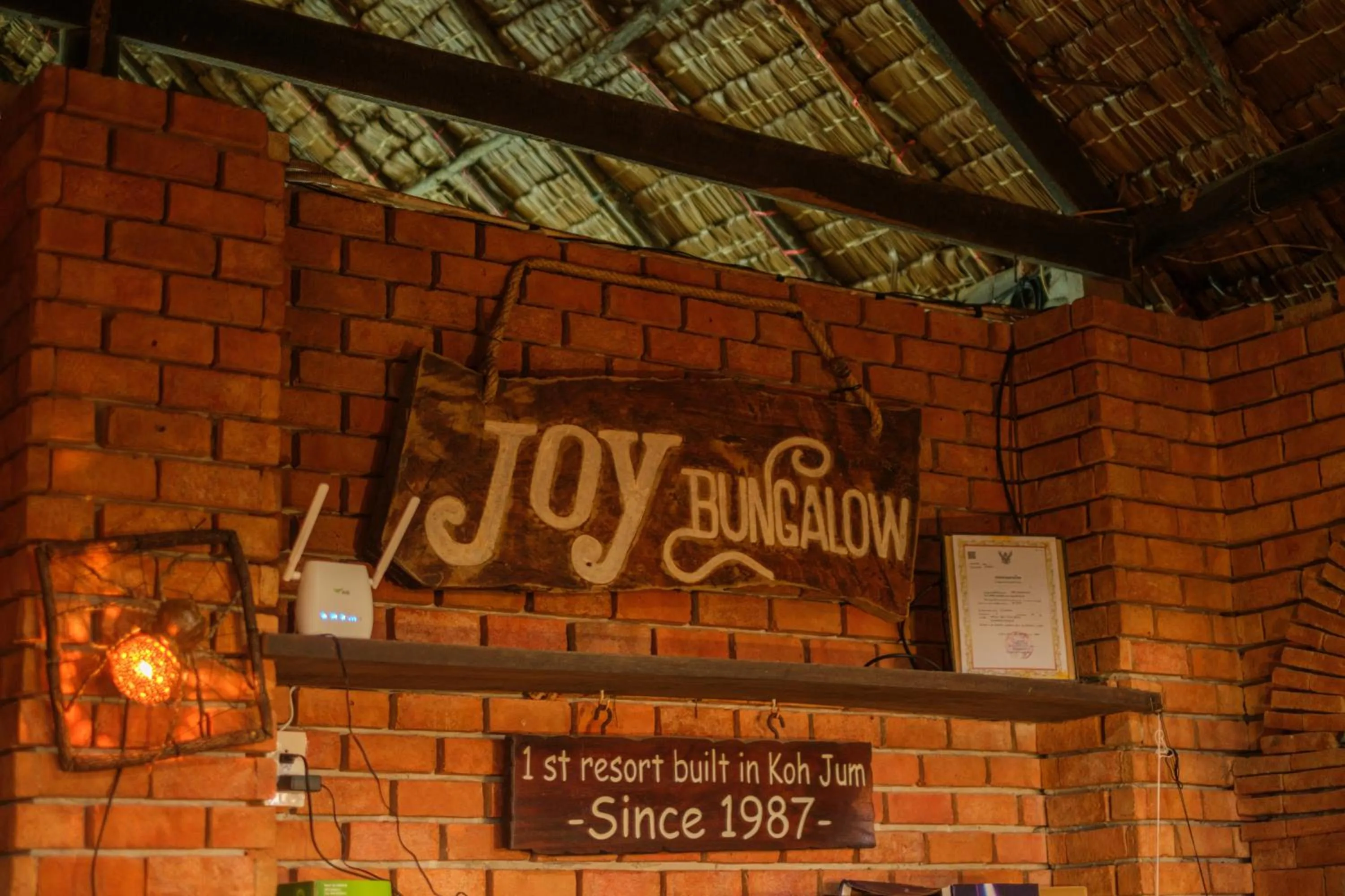 Property logo or sign in JOY Bungalow Resort and Restaurant