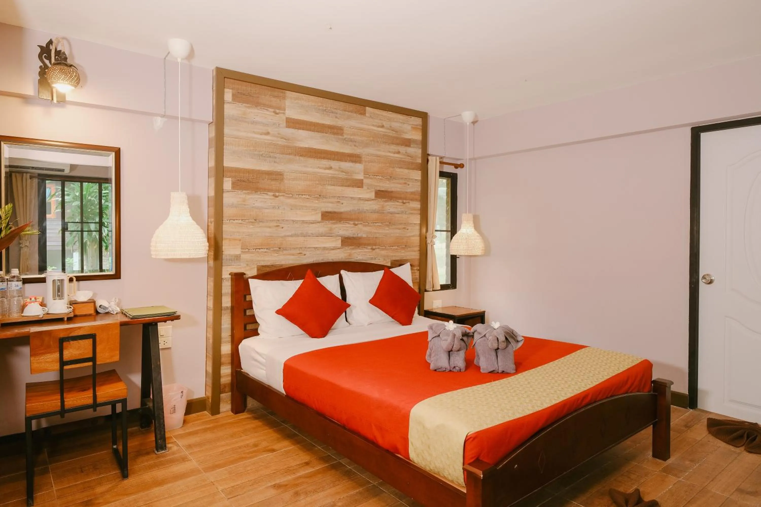 Bed in JOY Bungalow Resort and Restaurant