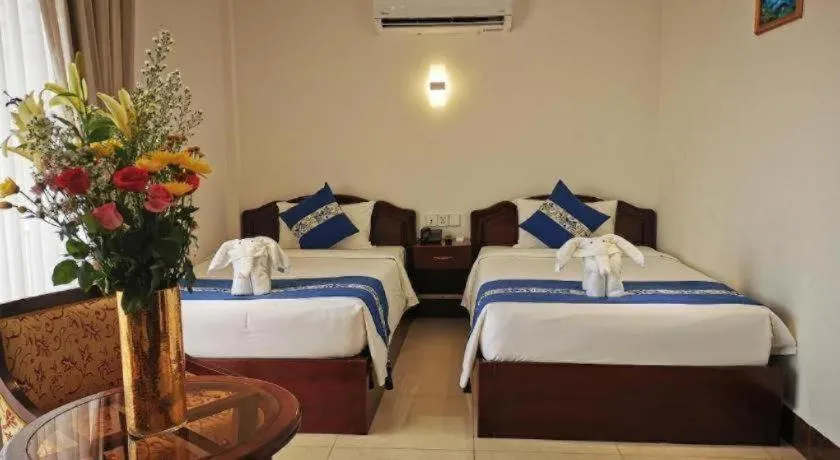 Bed in Jun Yue Hotel