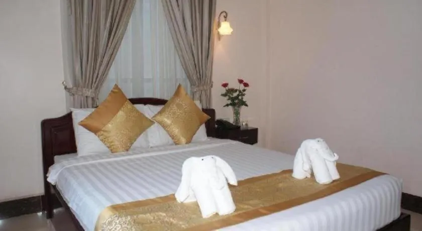 Bed in Jun Yue Hotel