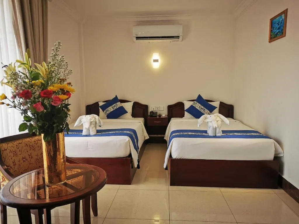 Bed in Jun Yue Hotel