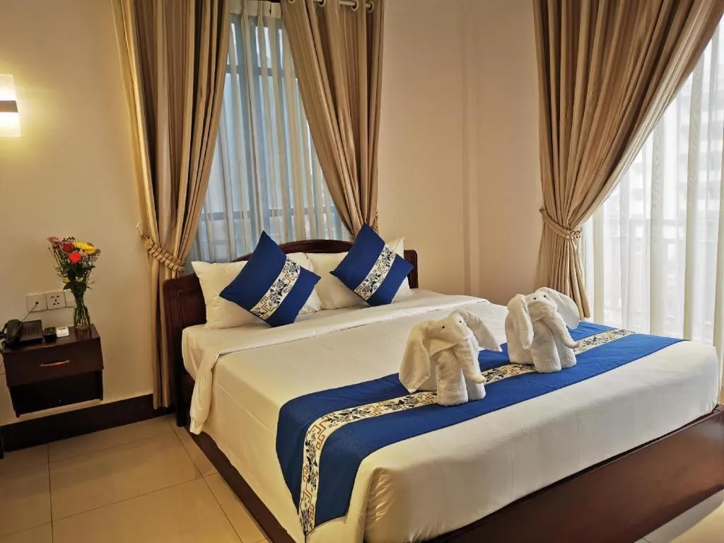 Bed in Jun Yue Hotel