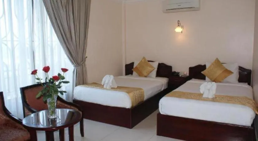 Bed in Jun Yue Hotel