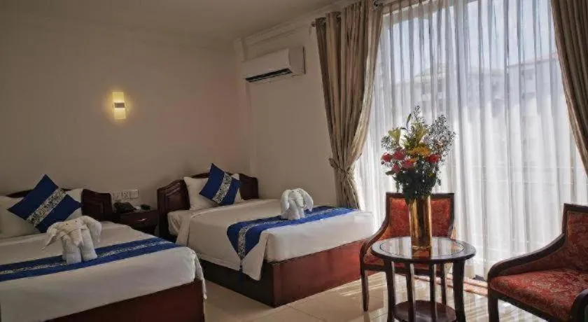 Bed in Jun Yue Hotel