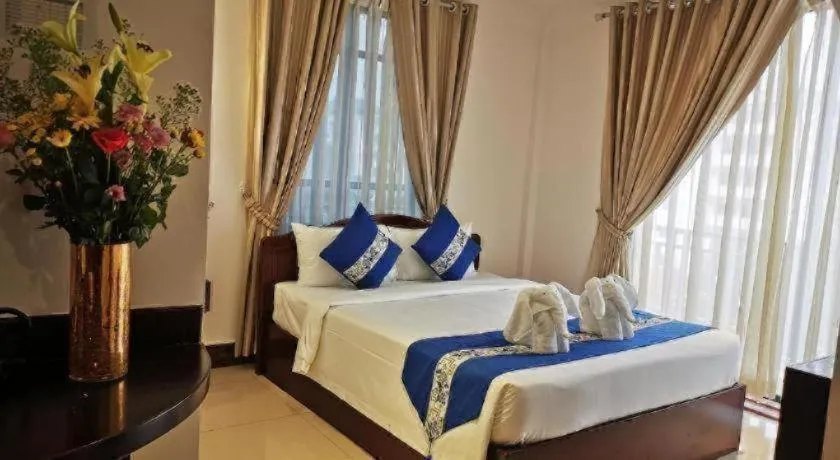 Bed in Jun Yue Hotel