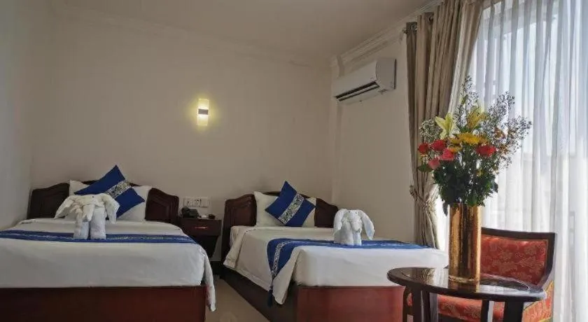 Bed in Jun Yue Hotel