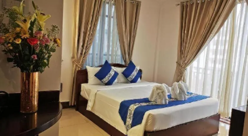 Bed in Jun Yue Hotel