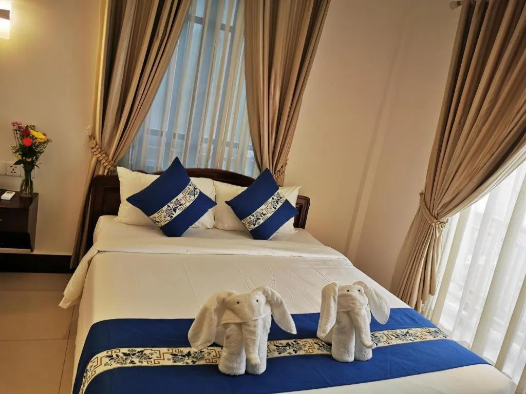 Bed in Jun Yue Hotel