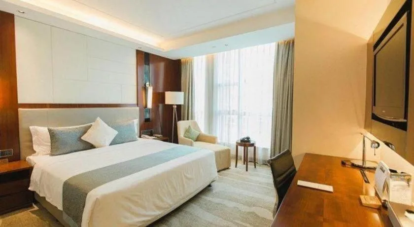 Bed in Grand Soluxe Zhongyou Hotel Shenzhen