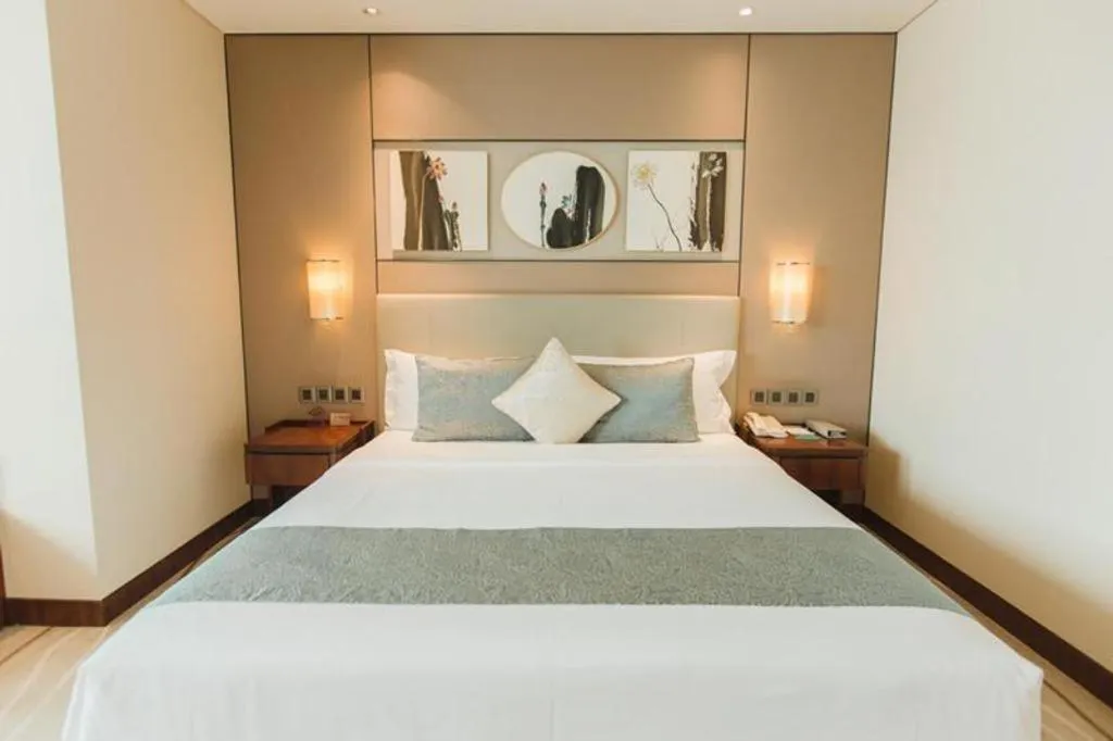 Bed in Grand Soluxe Zhongyou Hotel Shenzhen