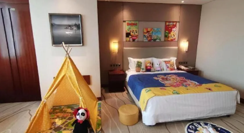 Bed in Grand Soluxe Zhongyou Hotel Shenzhen