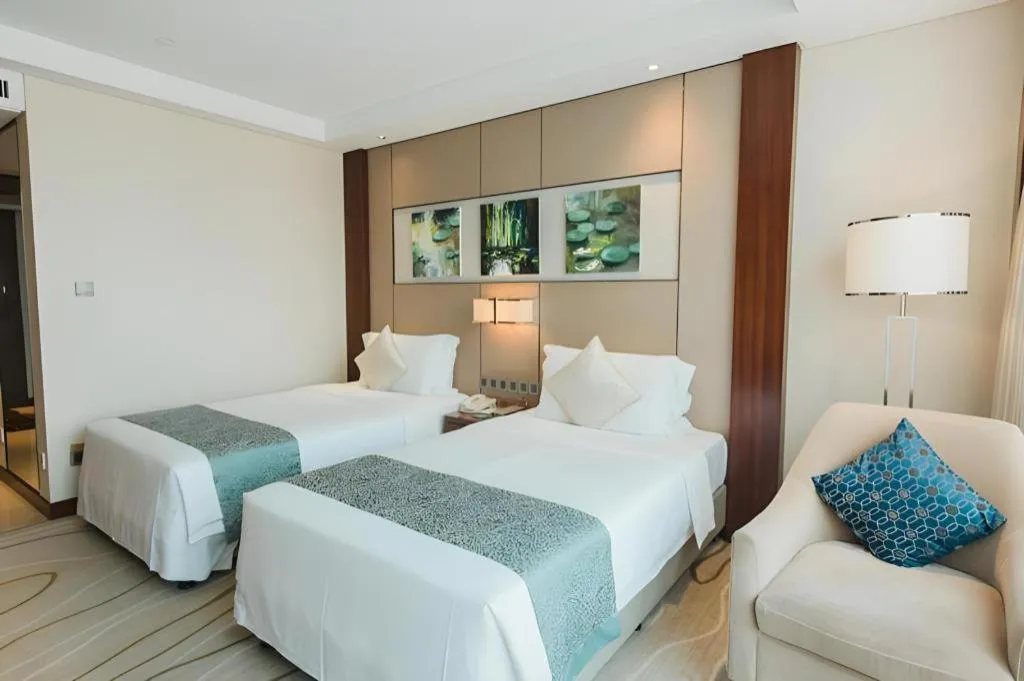 Bed in Grand Soluxe Zhongyou Hotel Shenzhen