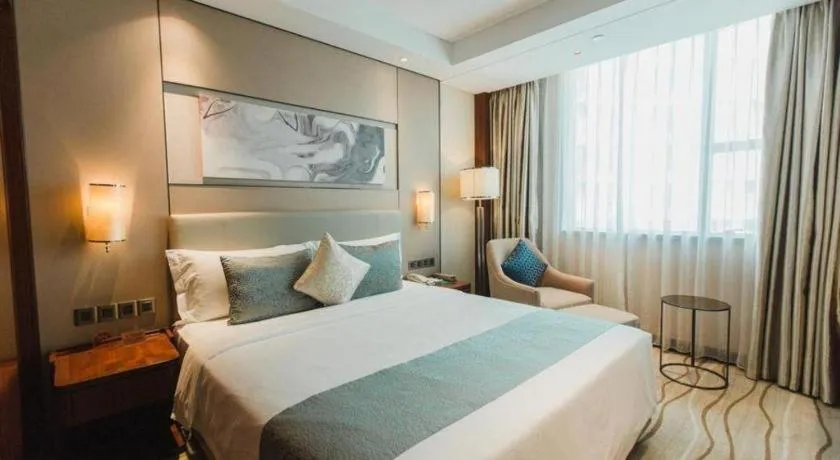 Bed in Grand Soluxe Zhongyou Hotel Shenzhen