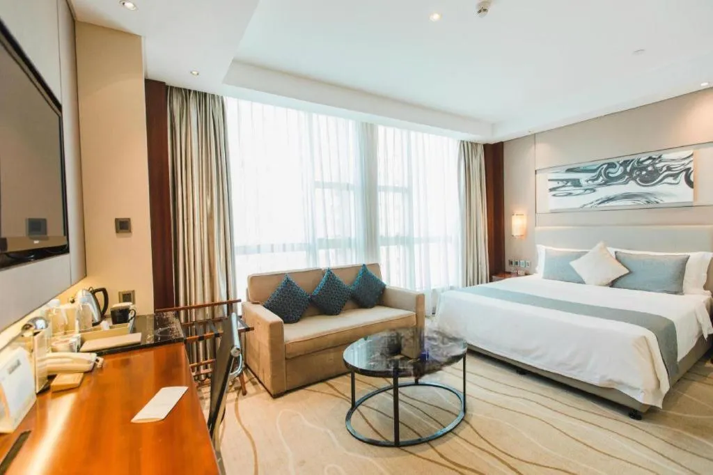 Bed in Grand Soluxe Zhongyou Hotel Shenzhen