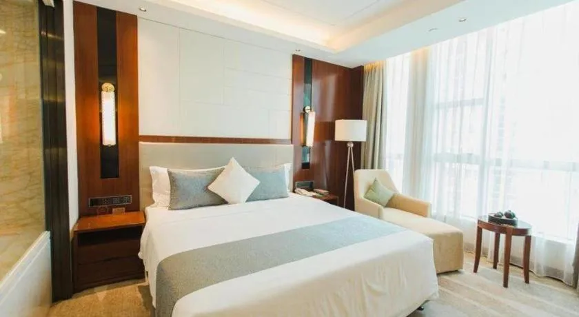 Bed in Grand Soluxe Zhongyou Hotel Shenzhen