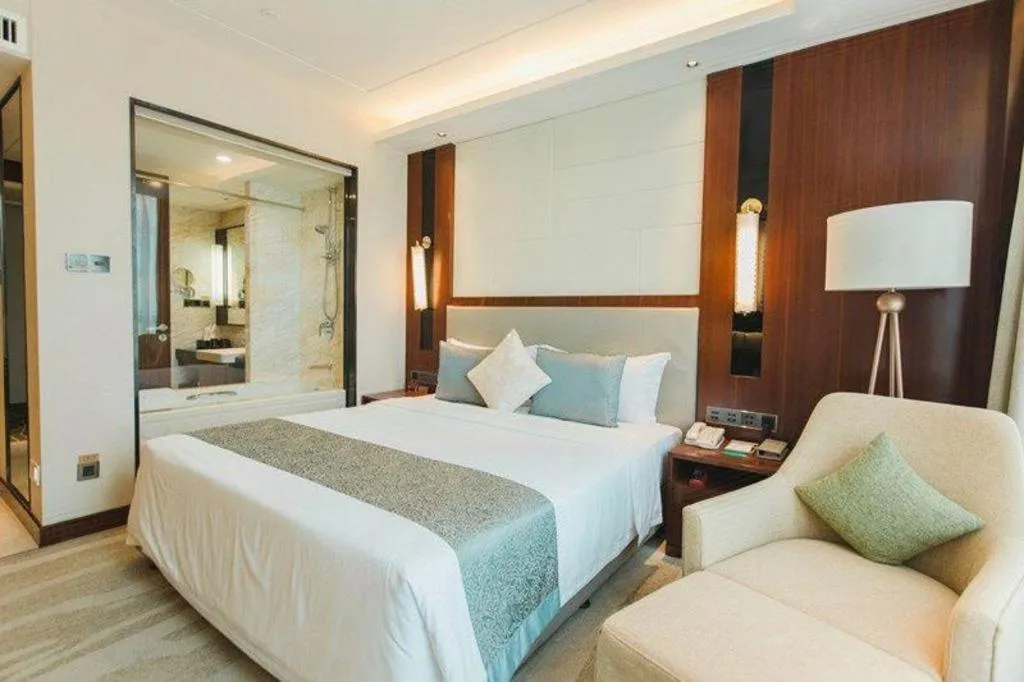 Bed in Grand Soluxe Zhongyou Hotel Shenzhen