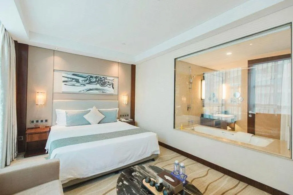 Bed in Grand Soluxe Zhongyou Hotel Shenzhen