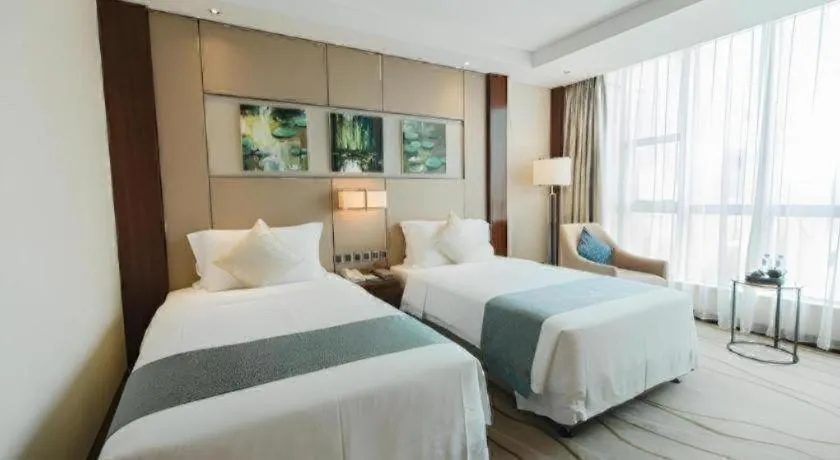 Bed in Grand Soluxe Zhongyou Hotel Shenzhen