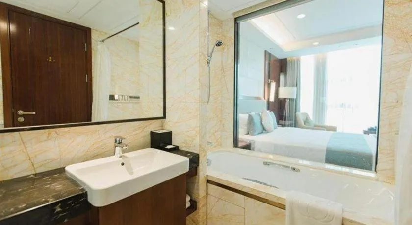 Bed in Grand Soluxe Zhongyou Hotel Shenzhen