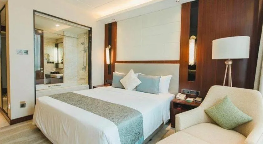 Bed in Grand Soluxe Zhongyou Hotel Shenzhen