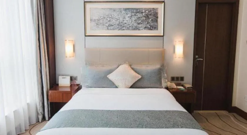 Bed in Grand Soluxe Zhongyou Hotel Shenzhen
