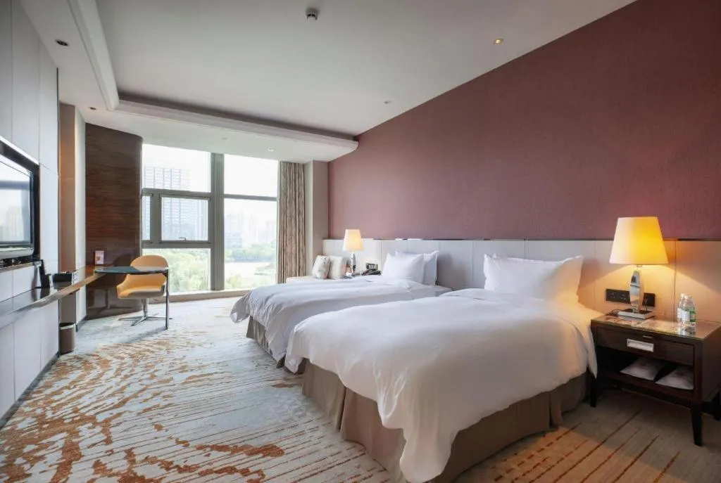 Bed in Nanjing Lakehome Hotels and Resorts