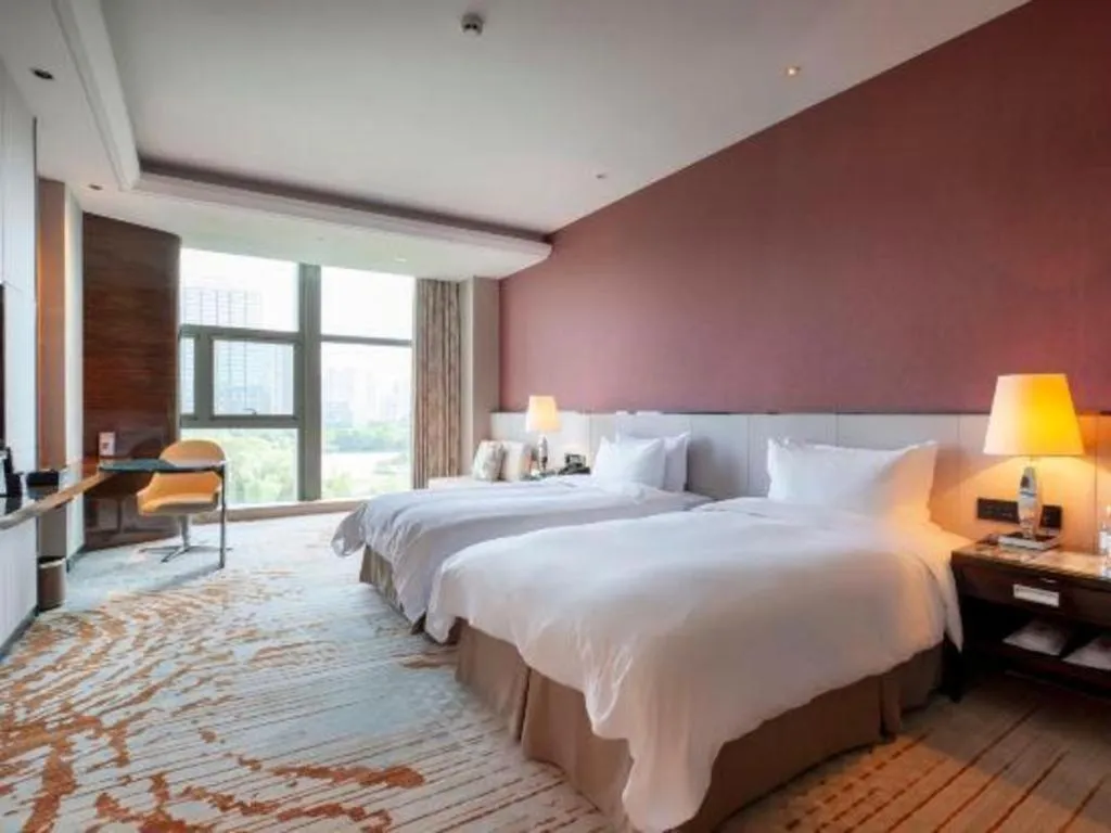 Bed in Nanjing Lakehome Hotels and Resorts
